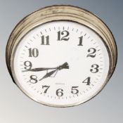 A circular contemporary wall clock with quartz movement,