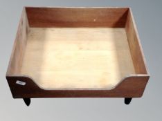 A mid century teak dog bed