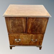 A George III inlaid mahogany commode cabinet