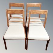 A set of four Victorian style ladder backed dining chairs