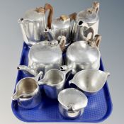 A tray of nine pieces of picquot tea ware