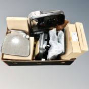 A box of vehicle wing mirrors and replacement mirror parts