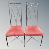 A set of four contemporary metal high backed dining chairs