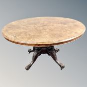 A Victorian inlaid walnut oval pedestal breakfast table