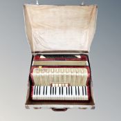 An Hohner Carena III piano accordian in case