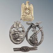 A WW II Panzer assault badge together with a Flak badge,