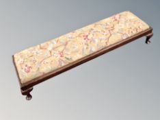 A late 19th century oversized footstool