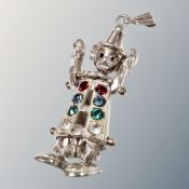 A silver clown charm