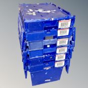 Four blue plastic storage crates with lids