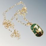 A continental yellow gold chain with jade pendant CONDITION REPORT: Chain