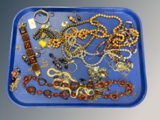 A good collection of costume jewellery, bakelite necklace, amber style cuff bracelet,