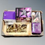 A box of brass door handles, BT phone set,