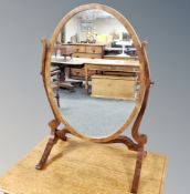 A Victorian style walnut dressing table mirror