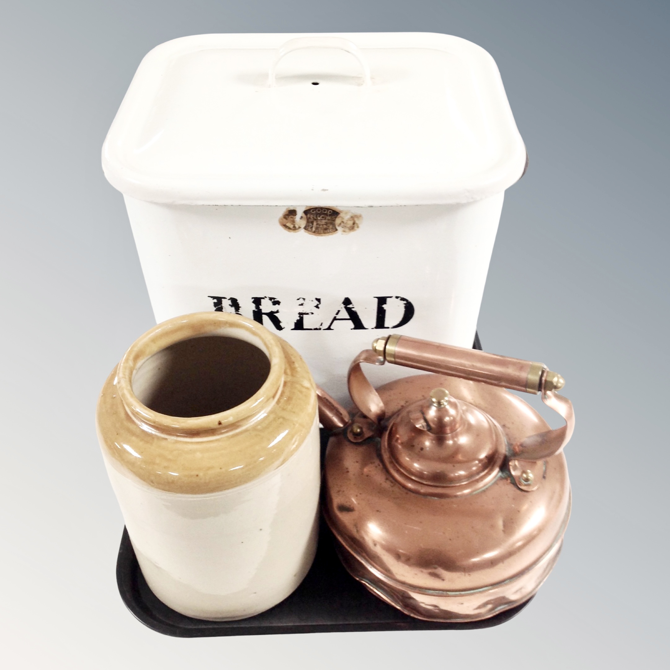 A Victorian copper kettle together with a stoneware kitchen storage jar and white enamelled lidded