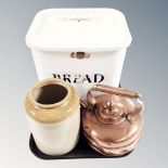 A Victorian copper kettle together with a stoneware kitchen storage jar and white enamelled lidded