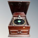 An early 20th century mahogany cased table topped gramophone