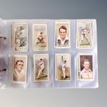 An album of Wills Players cigarette cards, Roses, Scottish footballers,
