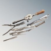 A box of vintage veterinary instruments