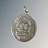 A silver medallion