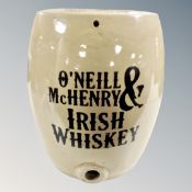 A stoneware barrel bearing O'neil and Mchenry Irish whisky advertising,