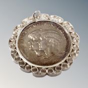 A silver mounted crown