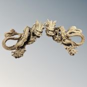 A pair of Chinese ornate brass dragon ornaments