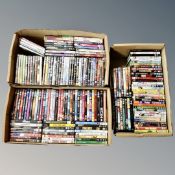 Three boxes containing approximately 150 dvds