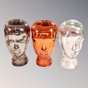 Three glass heads