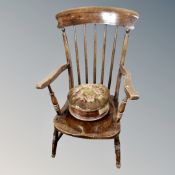 A 19th century spindle backed kitchen armchair together with further 19th century footstool