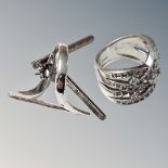 Two silver rings set with cubic zirconia