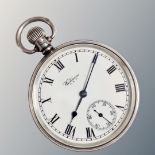 A silver Waltham pocket watch CONDITION REPORT: Serial number 26,671,464.