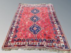 A Khamseh carpet, South West Iran, 254cm by 270cm.