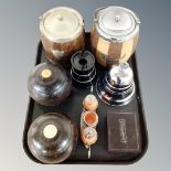 A tray of wooden lawn bowls, wooden biscuit barrels, bakelite cigarette box,