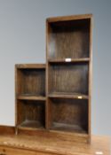 A set of 20th century oak stepped bookshelves