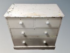 A Victorian painted pine four drawer chest