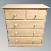 A pine Victorian style five drawer chest