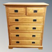 A campaign style six drawer chest