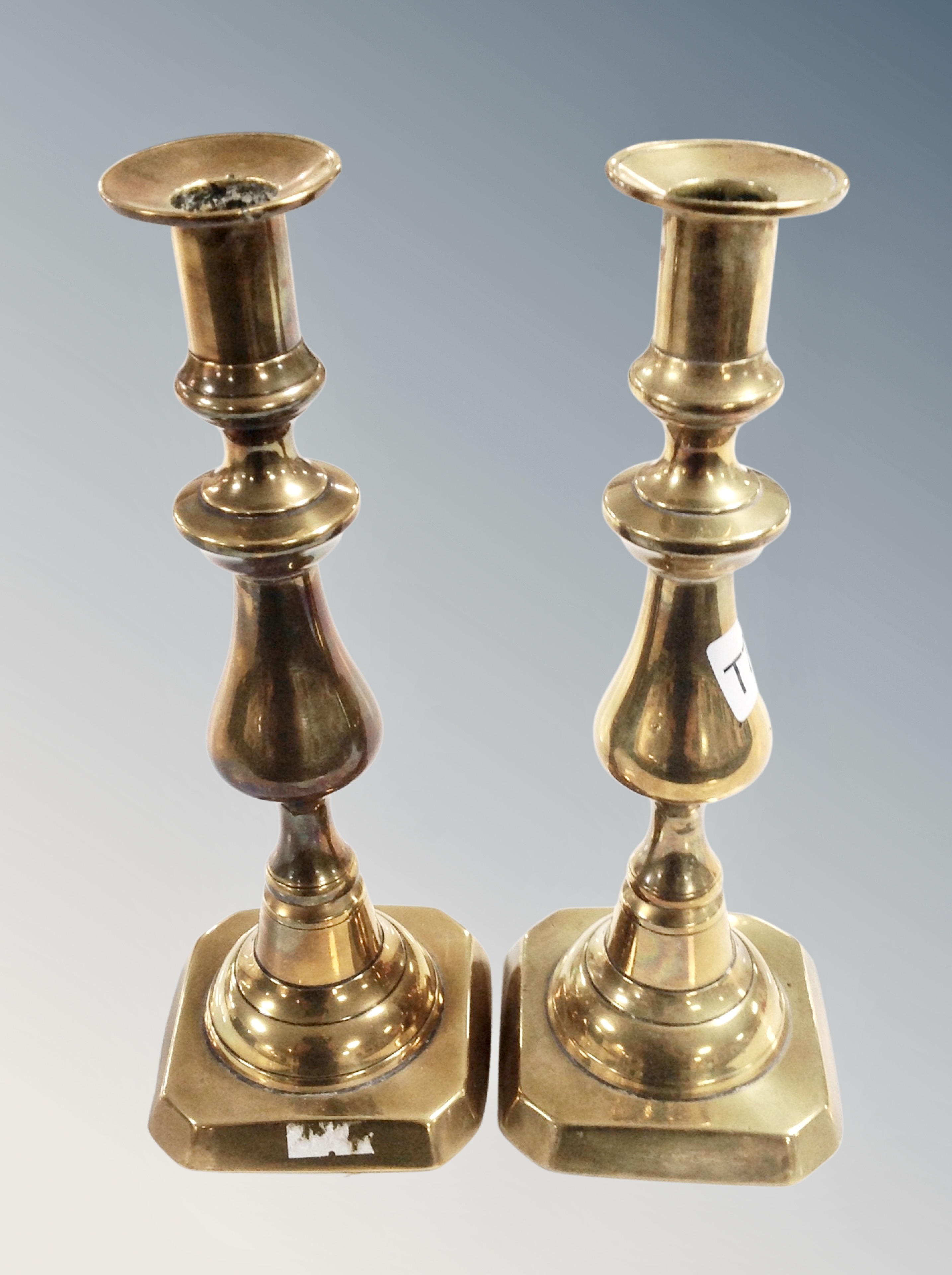 A pair of brass candlesticks, height 25 cm.