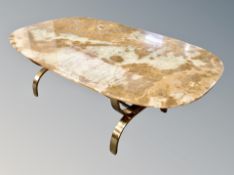 A very large Scandinavian brass and onyx polished oval coffee table,