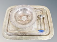 Two silver plated serving trays together with a pedestal bowl, weighted trumpet vase,