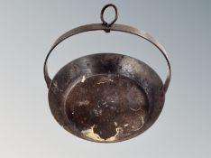 A 19th century cast iron frying pan.