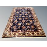 A machine made Persian designed rug 297 cm x 196 cm