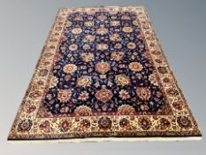 A machine made Persian designed rug 297 cm x 196 cm