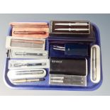 A tray of writing implements including Parker ballpoint pens etc.