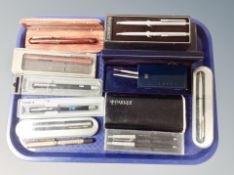 A tray of writing implements including Parker ballpoint pens etc.