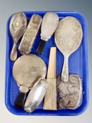 A tray of six silver-plated backed dressing table hand mirrors and brushes,