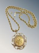 A George V full sovereign 1912 in 9ct gold mount, upon a gold-plated rope-twist chain.