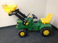 A child's John Deere 6400 ride on tractor