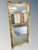 A Victorian style gilt framed overmantle mirror 183 cm x 82 cm