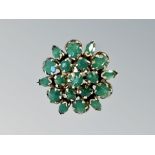 A gold emerald cluster ring, stamped 14ct, size L. CONDITION REPORT: 6.